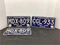Three 1973 Michigan License Plates