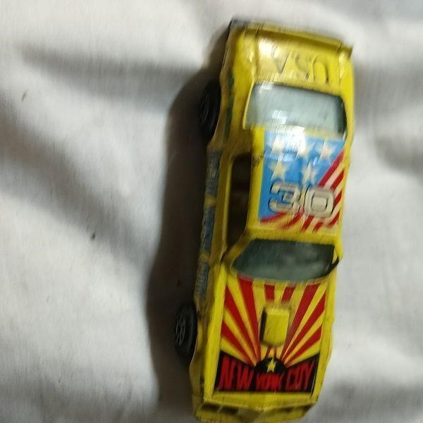 Trans am yellow die cast toy muscle car vehicle