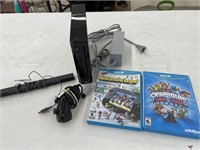 Black Wii w/ Nunchuck / 2 Games (powers on)
