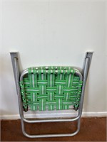 Green foldable lawn chair