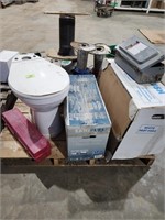 Pallet with White toilet with seat, Macerator/Pump