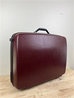 Vintage maroon suitcase