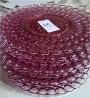 8 pink glass saucers