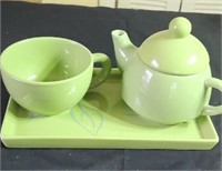 Adorable green tea set on tray