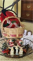 4 metal stocking hangers in a basket and 3 angels