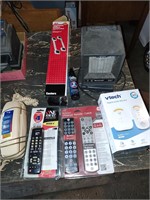 Mixed Lot, poster grip, hearing aids, remotes.