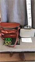 VTG polaroid camera, case and booklet