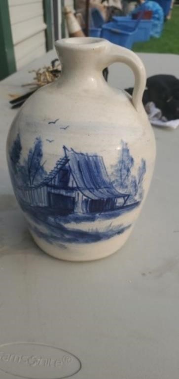 Storie pottery jug