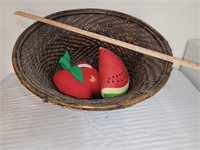 Large wicker basket with red plushies