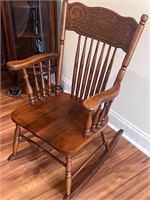 Carved wood rocking chair