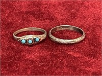 2 Ladies Silver Rings 1 w/ Symbol & 1 w/ Sterling