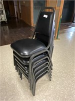 6 Black 1” Stack chairs (most like new)