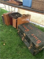 Steamer trunk and old suitcases