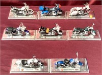 Eight Mounted Harley-Davidson Motorcycles With