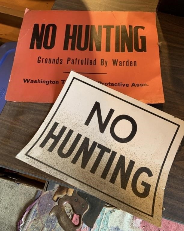 2 paper hunting signs