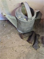 Wedges, galvanized watering can