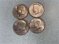 Four Bicentennial Kennedy half dollars