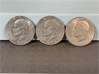 Three 1972D Ike dollars