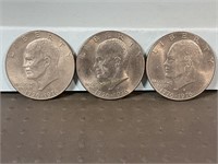 Three 1976D Ike dollars