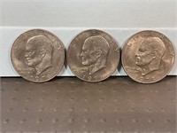 Three 1978 Ike dollars