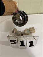 Can of rocks, including geode