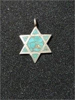 Sterling Star of David charm. Turquoise inlay.