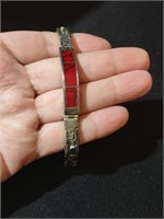 Mexican silver bracelet, red inlay detail.