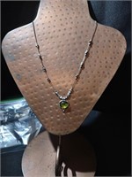 Sterling necklace with pretty peridot style set.