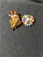 2 gorgeous Austrian crystal brooches. One is