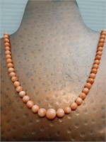 21 inch Graduated coral necklace with 14k clap