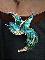 Pretty gold tone enameled hummingbird brooch