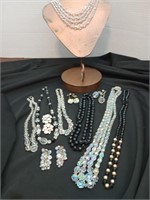 Black and clear crystal necklaces and earrings. 7