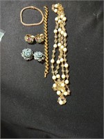 Joan Rivers necklace approx 48" long. 2 pair clip