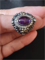 18K and sterling ring size 8, purple center glass