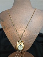 Gold tone necklace with an owl watch pendant