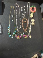 Group of assorted Avon jewelry. Some are sets,