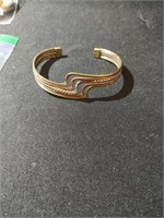 Copper, brass, and sterling cuff bracelet .