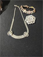 Weiss necklace, brooch and bracelet. Necklace is