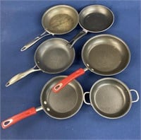 Assorted skillets including Rachael Ray,
