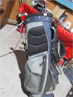 Golf bag with clubs, see photos
