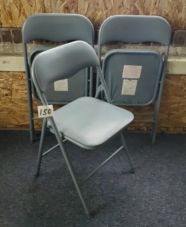 3 padded folding chairs