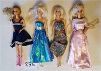 4 Barbie dolls