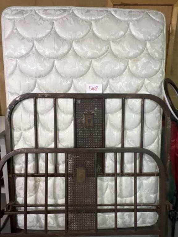 Full sized bed with vintage frame metal