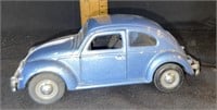 Light blue Volkswagen beetle