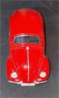 vintage red volkswagen beetle