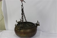 A Vintage Copper Basin With Chain