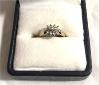 Ladies 14k gold diamond ring.