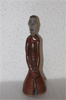 A Signed BG Pottery Figure