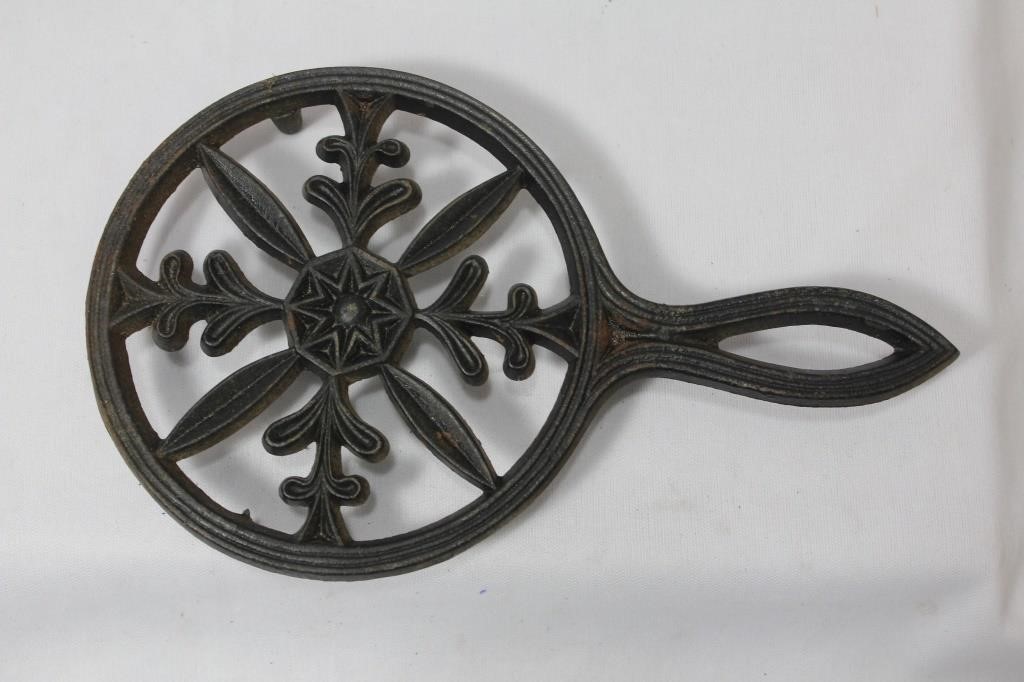 A Cast Iron Trivet