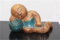 A Wooden Carved Chinese Sleeping Boy